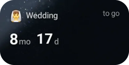 Small Clear widget: Wedding, 8 mo 17 d to go, drawn directly over the home-screen wallpaper.